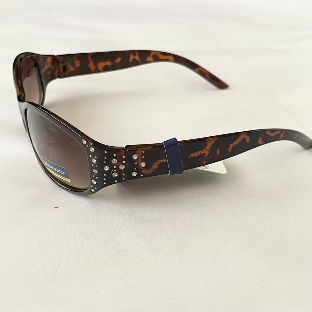 Brown tortoise shell sunglasses with rhinestone accents